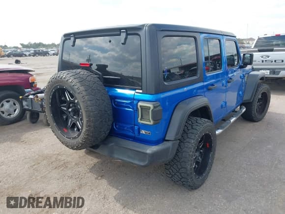✅ 2021 Jeep Wrangler Unlimited Sport Altitude • VIN: 1C4HJXDN1MW717458 • Lot: 43409535. Listed on IAAI with Not provided. Free auction sales archive from the USA and detailed vehicle history report at DreamBid. Image 4.