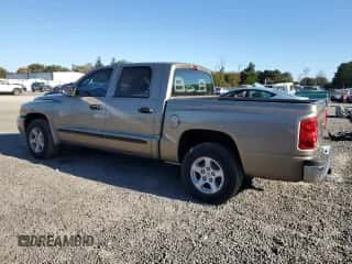 2006 Dodge Dakota SLT с VIN 1D7HE48K56S519839, выставлен на аукционе Copart как лот 77270724 с пробегом 202 320 миль миль и Списание • Salvage title. История ставок и продаж доступна на DreamBid. Изображение 2.