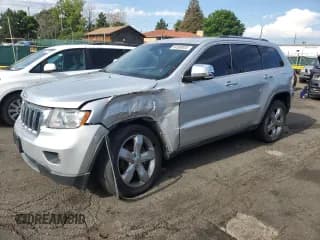 ✅ 2013 Jeep Grand Cherokee Limited • VIN: 1C4RJFBT0DC573354 • Lot: 64369935. Listed on Copart with 166,333 mi. Free auction sales archive from the USA and detailed vehicle history report at DreamBid. Image 1.