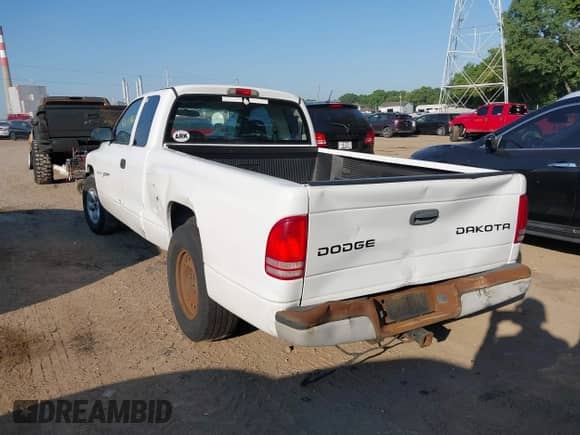 2004 Dodge Dakota Sport z VIN 1D7GL32K84S615322, wystawiony jako IAAI lot #42655462 z przebiegiem 187 209 mil mil oraz . Historia ofert i sprzedaży dostępna na DreamBid. Obrazek 3.