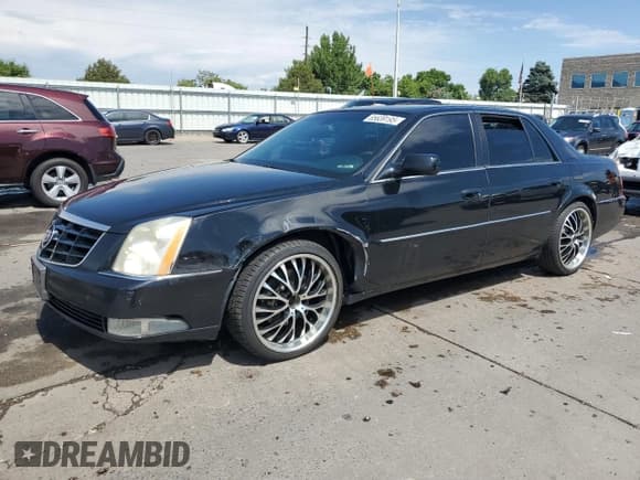 ✅ 2006 Cadillac DTS 1SE • VIN: 1G6KD57996U242434 • Lot: 65639195. Listed on Copart with 201,424 mi. Free auction sales archive from the USA and detailed vehicle history report at DreamBid. Image 1.