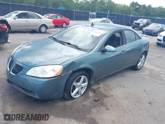 ✅ 2009 Pontiac G6 1SB • VIN: 1G2ZJ57K594255438 • Лот: 42469358. Опубликован ранее на IAAI с пробегом 271 832 миль. Бесплатный доступ к архиву аукционных продаж из США и подробный отчёт об истории автомобиля на DreamBid. Изображение 2.