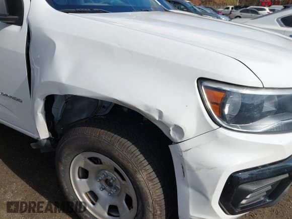 ✅ 2021 Chevrolet Colorado 4WD Work Truck • VIN: 1GCGTBEN6M1129902 • Лот: 43556456. Опубликован ранее на IAAI с пробегом 103 553 миль. Бесплатный доступ к архиву аукционных продаж из США и подробный отчёт об истории автомобиля на DreamBid. Изображение 6.