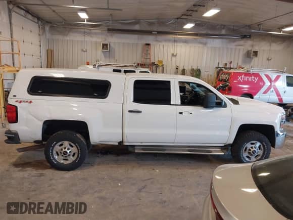 2016 Chevrolet Silverado 2500HD Work Truck z VIN 1GC1KUEG8GF104724, wystawiony jako IAAI lot #43374467 z przebiegiem Nie podano mil oraz . Historia ofert i sprzedaży dostępna na DreamBid. Obrazek 13.