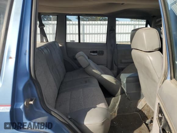 ✅ 1991 Jeep Cherokee • VIN: 1J4FJ58S1ML520376 • Lot: 75452364. Listed on Copart with 147,982 mi. Free auction sales archive from the USA and detailed vehicle history report at DreamBid. Image 11.