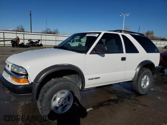 2005 Chevrolet Blazer LS с VIN 1GNCT18X65K106659, выставлен на аукционе Copart как лот 80054994 с пробегом 108 077 миль миль и Списание • Salvage title. История ставок и продаж доступна на DreamBid. Изображение 1.