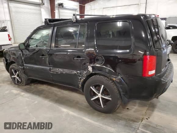 2010 Honda Pilot LX with VIN 5FNYF4H26AB031724, listed as a Copart auction lot 64199905 with 205,743 mi miles and Salvage title. Bid and sale history available at DreamBid. Image 2.