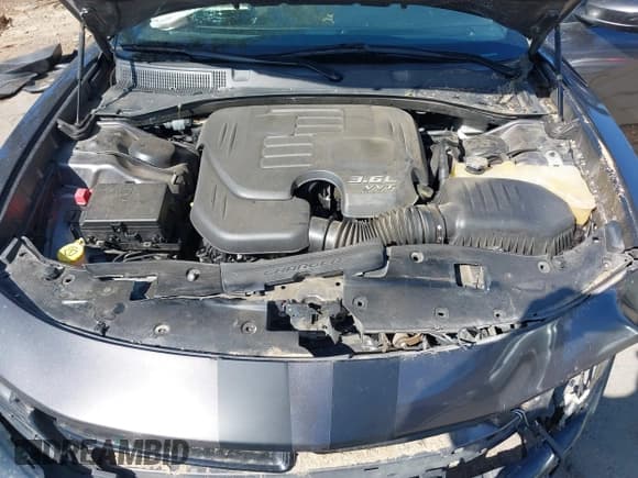 ✅ 2015 Dodge Charger SXT • VIN: 2C3CDXHG5FH825469 • Lot: 43511613. Listed on IAAI with 97,272 mi. Free auction sales archive from the USA and detailed vehicle history report at DreamBid. Image 10.