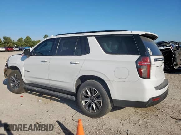 2022 Chevrolet Tahoe Z71 with VIN 1GNSKPKD4NR100687, listed as a Copart auction lot 84206455 with 63,741 mi miles and Salvage title. Bid and sale history available at DreamBid. Image 2.