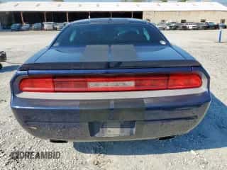 2013 Dodge Challenger SXT z VIN 2C3CDYAG6DH663428, wystawiony jako Copart lot #82074155 z przebiegiem 144 060 mil mil oraz Szkoda całkowita • Salvage title. Historia ofert i sprzedaży dostępna na DreamBid. Obrazek 6.