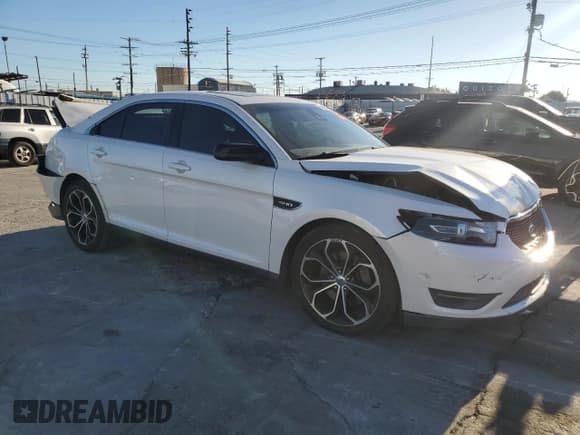 ✅ 2013 Ford Taurus SHO • VIN: 1FAHP2KT4DG140508 • Lot: 82628395. Listed on Copart with 148,897 mi. Free auction sales archive from the USA and detailed vehicle history report at DreamBid. Image 4.