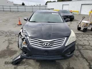 2013 Hyundai Azera z VIN KMHFH4JG0DA258021, wystawiony jako Copart lot #49187915 z przebiegiem 141 798 mil mil oraz Szkoda całkowita • Salvage title. Historia ofert i sprzedaży dostępna na DreamBid. Obrazek 5.