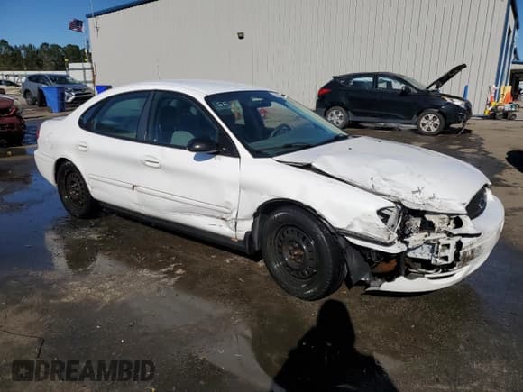 ✅ 2005 Ford Taurus SE • VIN: 1FAFP53U45A297380 • Лот: 87098315. Опубликован ранее на Copart с пробегом 142 856 миль. Бесплатный доступ к архиву аукционных продаж из США и подробный отчёт об истории автомобиля на DreamBid. Изображение 4.