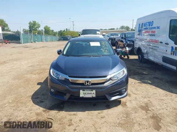 ✅ 2018 Honda Civic EX-T • VIN: JHMFC1F35JX023886 • Lot: 42915493. Listed on IAAI with 69,527 mi. Free auction sales archive from the USA and detailed vehicle history report at DreamBid. Image 12.