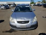 ✅ 2009 Kia Rio LX • VIN: KNADE243896542523 • Lot: 70467655. Listed on Copart with 121,444 mi. Free auction sales archive from the USA and detailed vehicle history report at DreamBid. Image 5.