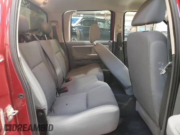 2008 Dodge Dakota z VIN 1D7HW38N38S535025, wystawiony jako Copart lot #77204754 z przebiegiem 245 225 mil mil oraz Szkoda całkowita • Salvage title. Historia ofert i sprzedaży dostępna na DreamBid. Obrazek 10.