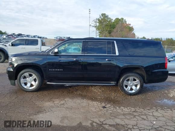 2020 Chevrolet Suburban Premier z VIN 1GNSCJKC0LR121728, wystawiony jako IAAI lot #41105003 z przebiegiem 43 820 mil mil oraz . Historia ofert i sprzedaży dostępna na DreamBid. Obrazek 14.