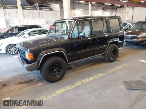 ✅ 1991 Isuzu Trooper • VIN: JACCH58R8M7902476 • Lot: 41893980. Listed on IAAI with 169,269 mi. Free auction sales archive from the USA and detailed vehicle history report at DreamBid. Image 17.