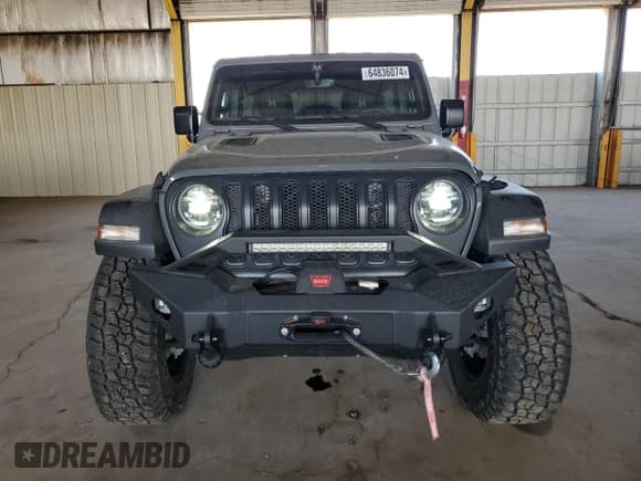 ✅ 2022 Jeep Wrangler Unlimited High Tide • VIN: 1C4HJXDG2NW221829 • Lot: 64836074. Listed on Copart with 3,394 mi. Free auction sales archive from the USA and detailed vehicle history report at DreamBid. Image 5.