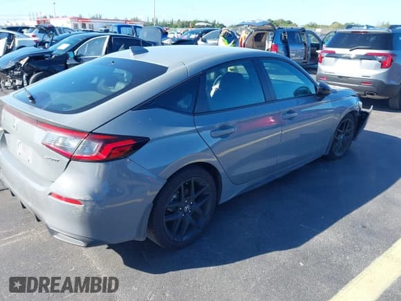 ✅ 2025 Honda Civic Sport • VIN: 19XFL2H8XSE012416 • Lot: 43350950. Listed on IAAI with 10,569 mi. Free auction sales archive from the USA and detailed vehicle history report at DreamBid. Image 4.