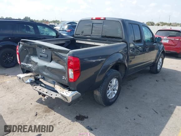 ✅ 2015 Nissan Frontier SV • VIN: 1N6AD0ER7FN751153 • Lot: 43525379. Listed on IAAI with 211,834 mi. Free auction sales archive from the USA and detailed vehicle history report at DreamBid. Image 4.