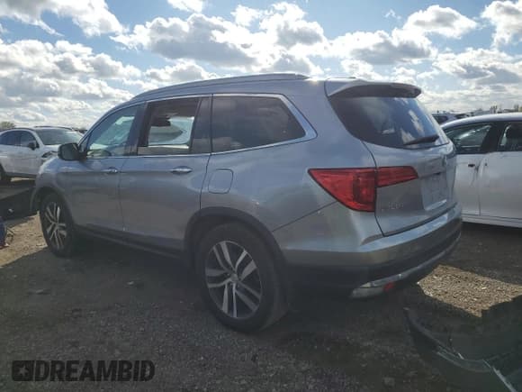 ✅ 2017 Honda Pilot Touring • VIN: 5FNYF5H92HB046640 • Lot: 87243885. Listed on Copart with 112,152 mi. Free auction sales archive from the USA and detailed vehicle history report at DreamBid. Image 2.