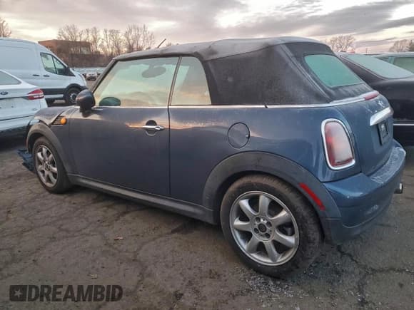 ✅ 2010 MINI Convertible • VIN: WMWMR3C59ATU97143 • Lot: 94448275. Listed on Copart with 73,173 mi. Free auction sales archive from the USA and detailed vehicle history report at DreamBid. Image 2.