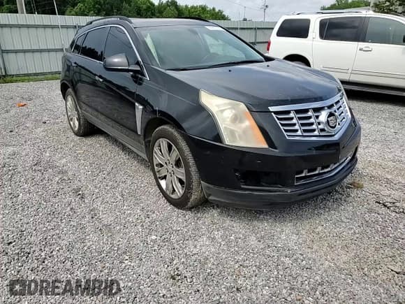 ✅ 2016 Cadillac SRX • VIN: 3GYFNAE38GS530976 • Lot: 61811775. Wystawiony na Copart z przebiegiem 220 745 mil. Bezpłatny archiwum sprzedaży aukcyjnych z USA i szczegółowy raport historii pojazdu na DreamBid. Zdjęcie 14.