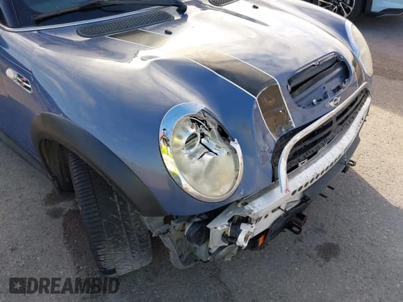 ✅ 2005 MINI Convertible S • VIN: WMWRH33475TF82636 • Lot: 43261691. Listed on IAAI with 127,918 mi. Free auction sales archive from the USA and detailed vehicle history report at DreamBid. Image 17.