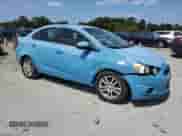 2014 Chevrolet Sonic LT с VIN 1G1JC5SH2E4163947, выставлен на аукционе Copart как лот 64984734 с пробегом Не указан миль и Списание • Salvage title. История ставок и продаж доступна на DreamBid. Изображение 4.