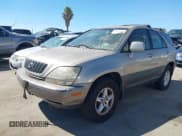 ✅ 2001 Lexus RX 300 • VIN: JTJGF10U210117096 • Lot: 43169294. Listed on IAAI with 203,037 mi. Free auction sales archive from the USA and detailed vehicle history report at DreamBid. Image 2.