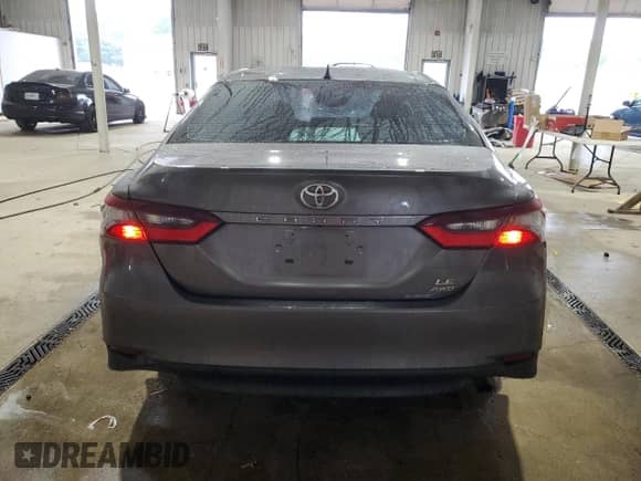 2023 Toyota Camry LE с VIN 4T1R11BK1PU095790, выставлен на аукционе Copart как лот 62891515 с пробегом 60 790 миль миль и Списание • Salvage title. История ставок и продаж доступна на DreamBid. Изображение 6.