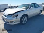 ✅ 2000 Lexus ES 300 • VIN: JT8BF28G4Y5102497 • Лот: 43650282. Опубликован ранее на IAAI с пробегом 128 348 миль. Бесплатный доступ к архиву аукционных продаж из США и подробный отчёт об истории автомобиля на DreamBid. Изображение 2.