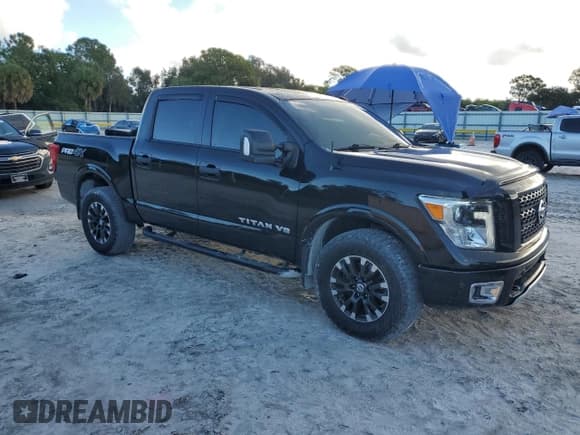 ✅ 2019 Nissan Titan Pro-4X • VIN: 1N6AA1E50KN523906 • Lot: 81147745. Wystawiony na Copart z przebiegiem 73 146 mil. Bezpłatny archiwum sprzedaży aukcyjnych z USA i szczegółowy raport historii pojazdu na DreamBid. Zdjęcie 4.