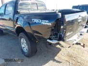 ✅ 2015 Toyota Tacoma • VIN: 3TMLU4EN2FM169326 • Lot: 40689500. Listed on IAAI with 77,003 mi. Free auction sales archive from the USA and detailed vehicle history report at DreamBid. Image 6.