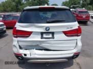 ✅ 2015 BMW X5 xDrive35d • VIN: 5UXKS4C57F0N09608 • Lot: 42037628. Listed on IAAI with 126,014 mi. Free auction sales archive from the USA and detailed vehicle history report at DreamBid. Image 6.