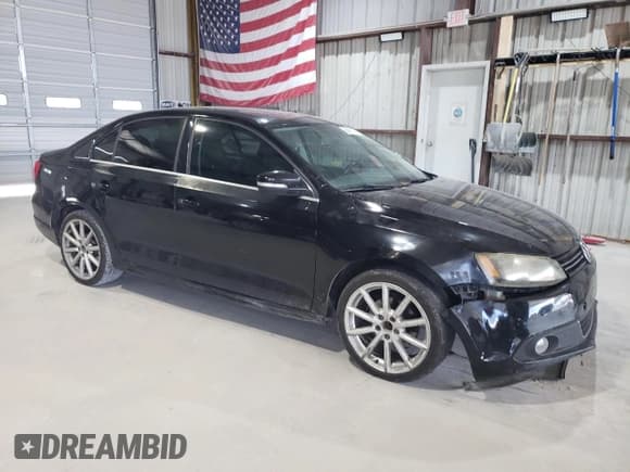 ✅ 2013 Volkswagen Jetta TDI w/Premium/Nav • VIN: 3VW3L7AJ2DM292383 • Lot: 66886315. Listed on Copart with 193,519 mi. Free auction sales archive from the USA and detailed vehicle history report at DreamBid. Image 4.