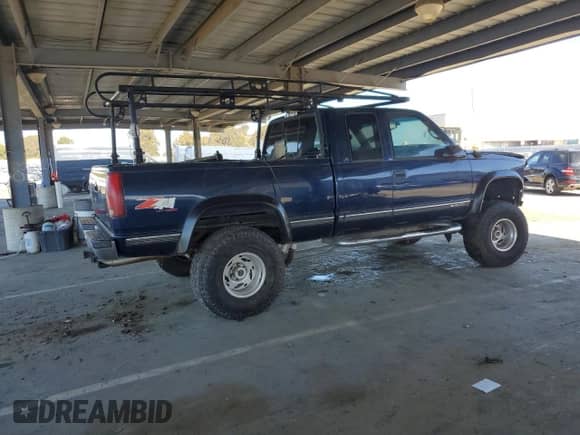 1999 Chevrolet Silverado 1500 with VIN 1GCEK19R1XR140331, listed as a Copart auction lot 45966785 with 147,140 mi miles and Clean title. Bid and sale history available at DreamBid. Image 3.