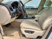 ✅ 2013 Volkswagen Touareg Exec • VIN: WVGEF9BP3DD012463 • Lot: 57499915. Listed on Copart with 104,981 mi. Free auction sales archive from the USA and detailed vehicle history report at DreamBid. Image 7.