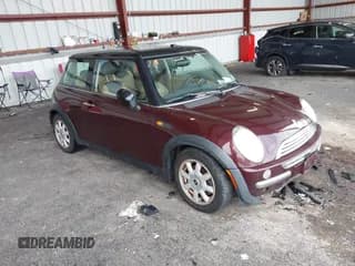 ✅ 2003 MINI Hardtop • VIN: WMWRC33473TC39868 • Лот: 41279678. Опубликован ранее на IAAI с пробегом 162 005 миль. Бесплатный доступ к архиву аукционных продаж из США и подробный отчёт об истории автомобиля на DreamBid. Изображение 1.