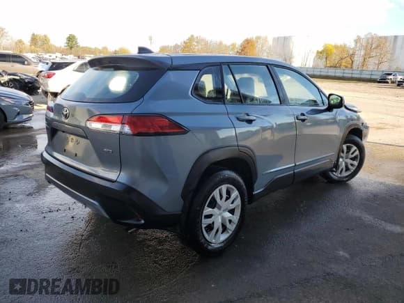 ✅ 2022 Toyota Corolla Cross L • VIN: 7MUAAABG9NV034823 • Lot: 89881115. Listed on Copart with 21,466 mi. Free auction sales archive from the USA and detailed vehicle history report at DreamBid. Image 3.