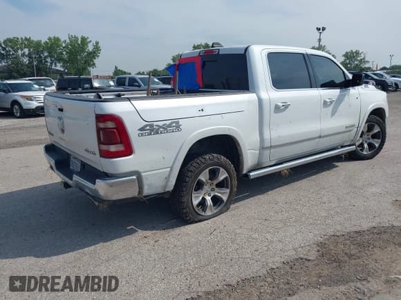 ✅ 2021 Ram 1500 Laramie • VIN: 1C6SRFJT2MN568292 • Lot: 42831621. Listed on IAAI with 81,902 mi. Free auction sales archive from the USA and detailed vehicle history report at DreamBid. Image 4.