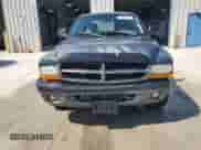 2002 Dodge Dakota Sport z VIN 1B7GL32XX2S588725, wystawiony jako Copart lot #65541345 z przebiegiem 205 568 mil mil oraz Szkoda całkowita • Salvage title. Historia ofert i sprzedaży dostępna na DreamBid. Obrazek 5.