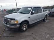 ✅ 2002 Ford F-150 XLT • VIN: 1FTRW07L52KB36296 • Lot: 43655860. Listed on IAAI with 262,218 mi. Free auction sales archive from the USA and detailed vehicle history report at DreamBid. Image 2.