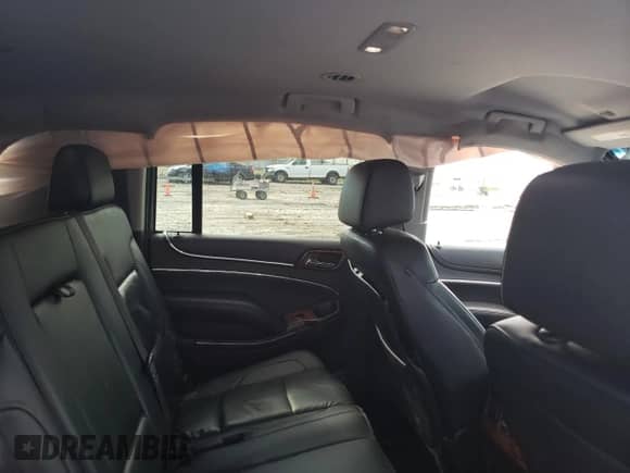 2015 Chevrolet Suburban LT z VIN 1GNSKJKC8FR254972, wystawiony jako Copart lot #65587584 z przebiegiem 161 495 mil mil oraz Szkoda całkowita • Salvage title. Historia ofert i sprzedaży dostępna na DreamBid. Obrazek 12.