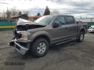 ✅ 2018 Ford F-150 XL • VIN: 1FTEW1E54JFB32062 • Lot: 92368325. Listed on Copart with 112,748 mi. Free auction sales archive from the USA and detailed vehicle history report at DreamBid. Image 1.