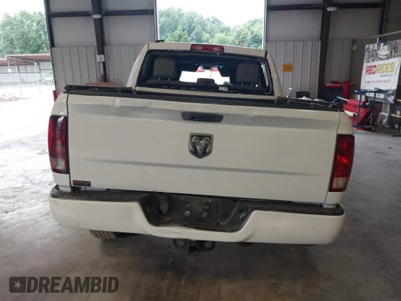 2014 Ram 1500 Tradesman z VIN 1C6RR6KG3ES480709, wystawiony jako IAAI lot #42817489 z przebiegiem 170 425 mil mil oraz . Historia ofert i sprzedaży dostępna na DreamBid. Obrazek 17.
