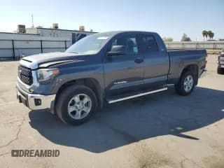 ✅ 2018 Toyota Tundra SR • VIN: 5TFRM5F1XJX128098 • Lot: 86114335. Listed on Copart with 84,597 mi. Free auction sales archive from the USA and detailed vehicle history report at DreamBid. Image 1.