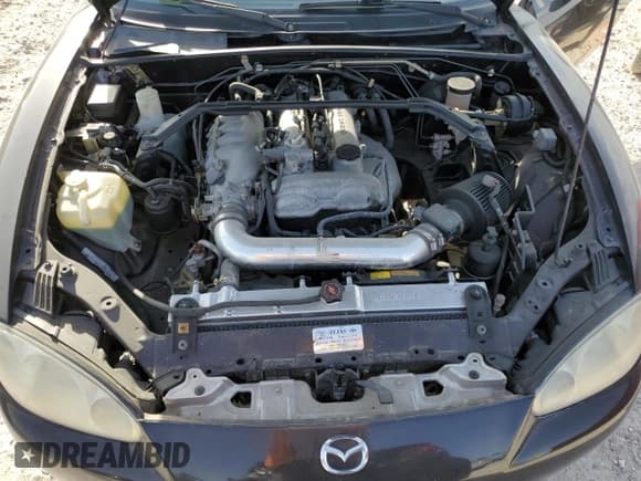 ✅ 2004 Mazda MX-5 Miata Cloth • VIN: JM1NB353740401958 • Лот: 48239435. Опубликован ранее на Copart с пробегом 165 137 миль. Бесплатный доступ к архиву аукционных продаж из США и подробный отчёт об истории автомобиля на DreamBid. Изображение 11.