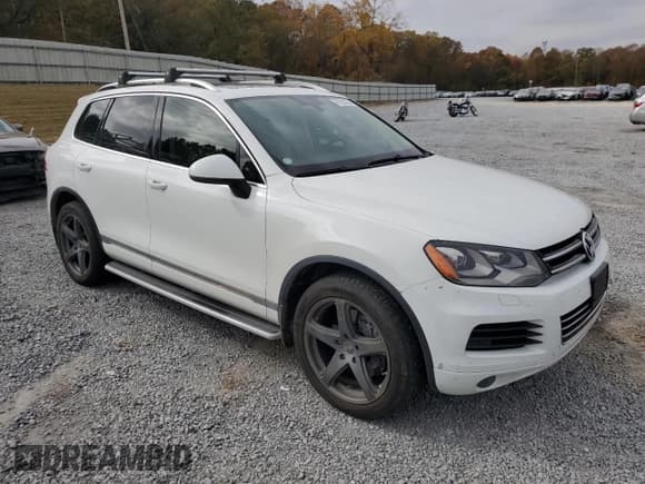 ✅ 2013 Volkswagen Touareg • VIN: WVGEG9BPXDD012733 • Lot: 91858355. Listed on Copart with 116,232 mi. Free auction sales archive from the USA and detailed vehicle history report at DreamBid. Image 4.